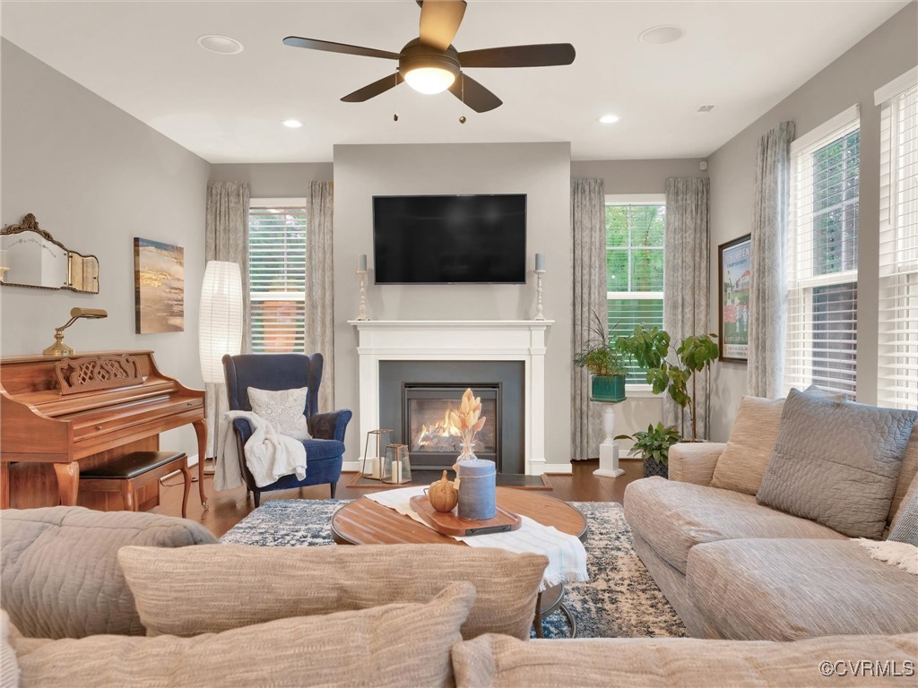10168 Kellys Bluff Run Ashland, VA 23005 - Photo 10 of 50 a living room with furniture fireplace and flat screen tv