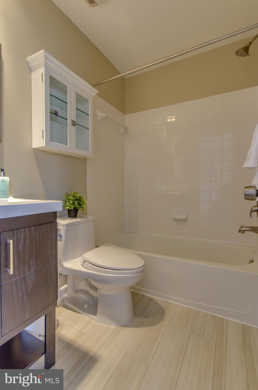 2116 12th Street Northwest Washington, DC 20009 - Photo 20 of 30 a bathroom with a toilet and a shower