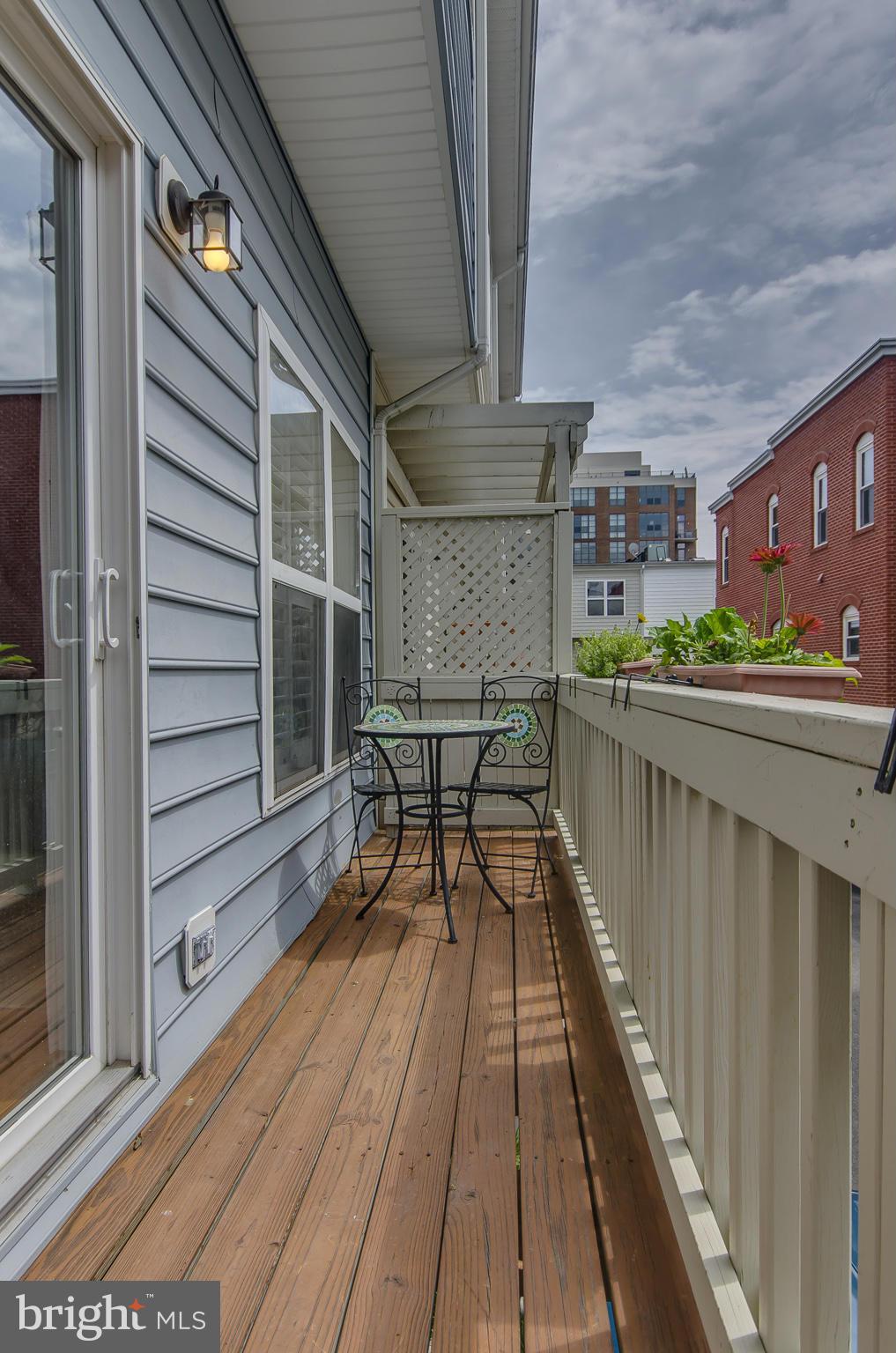 2116 12th Street Northwest Washington, DC 20009 - Photo 22 of 30 a balcony with view of outdoor space