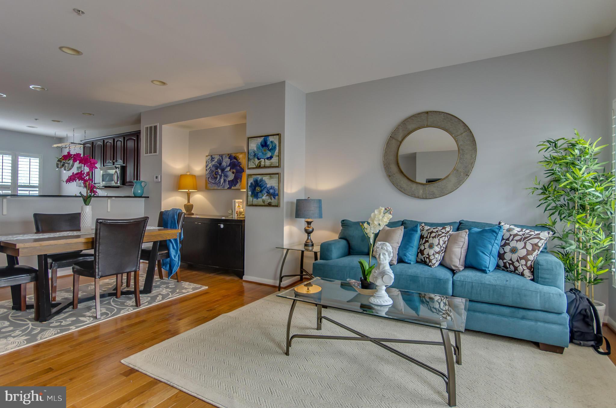 2116 12th Street Northwest Washington, DC 20009 - Photo 4 of 30 a living room with furniture and a large window