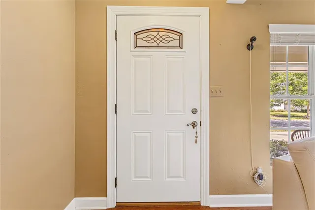 a living room with furniture fireplace and a flat screen tv