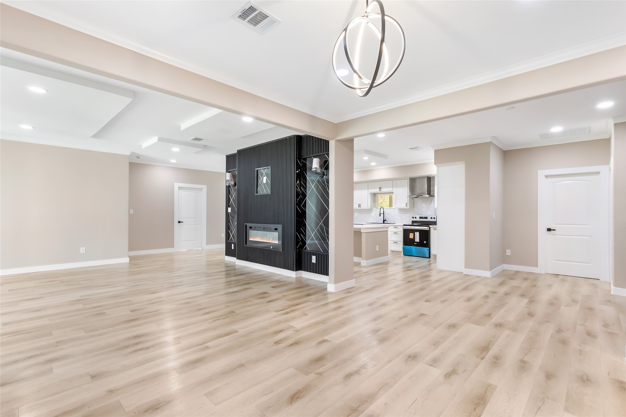 26707 Apache Trail Magnolia, TX 77354 - Photo 15 of 37 a view of an empty room with a kitchen