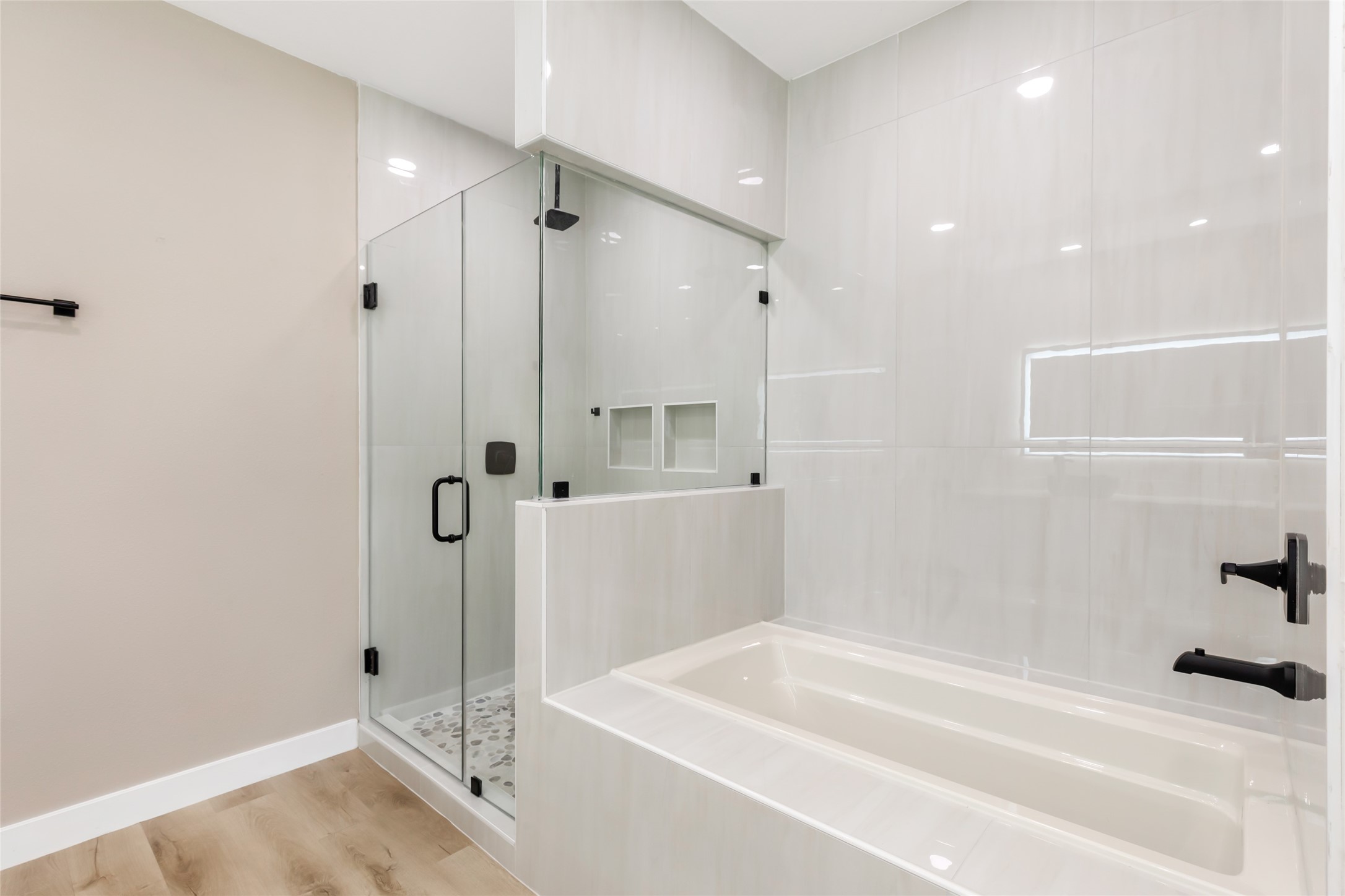 26707 Apache Trail Magnolia, TX 77354 - Photo 34 of 37 a bathroom with a tub and shower