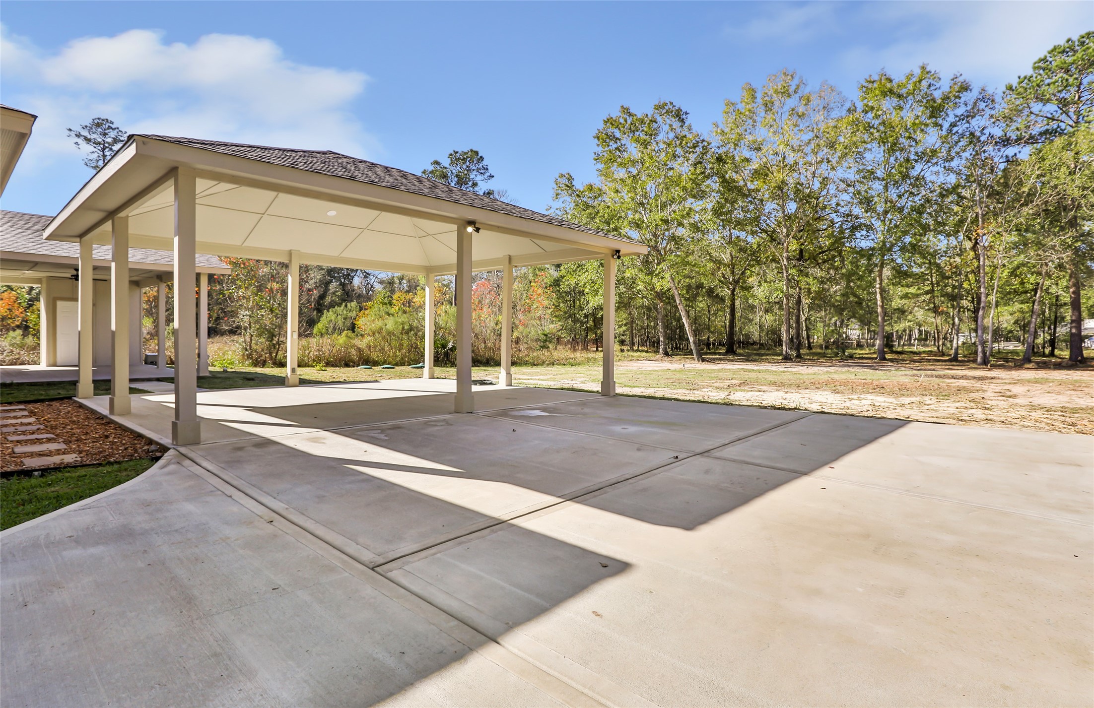 26707 Apache Trail Magnolia, TX 77354 - Photo 4 of 37 a view of a building with a big yard and large tree