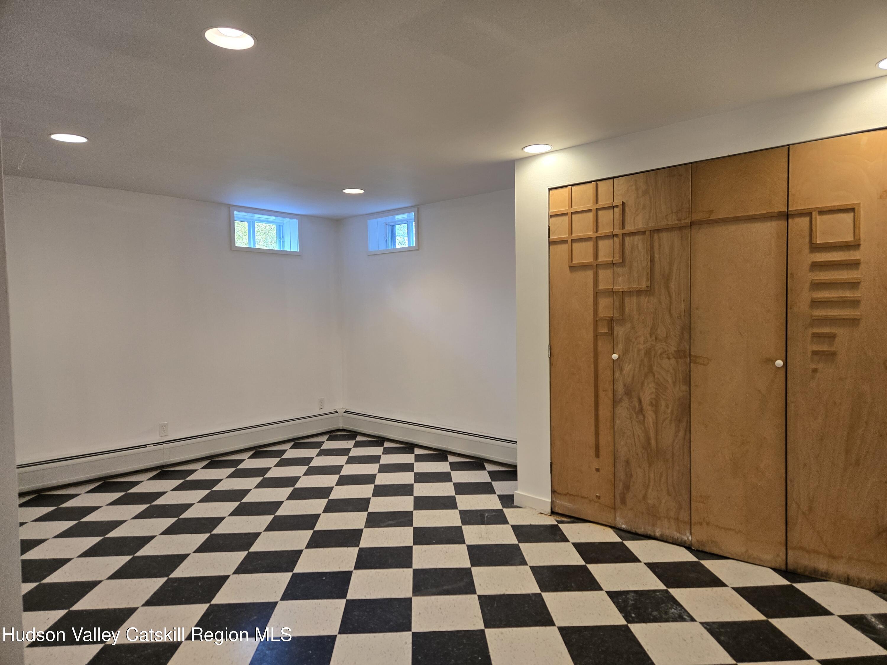 84 Highland Road Stone Ridge, NY 12484 - Photo 17 of 20 a black and white checkered floor