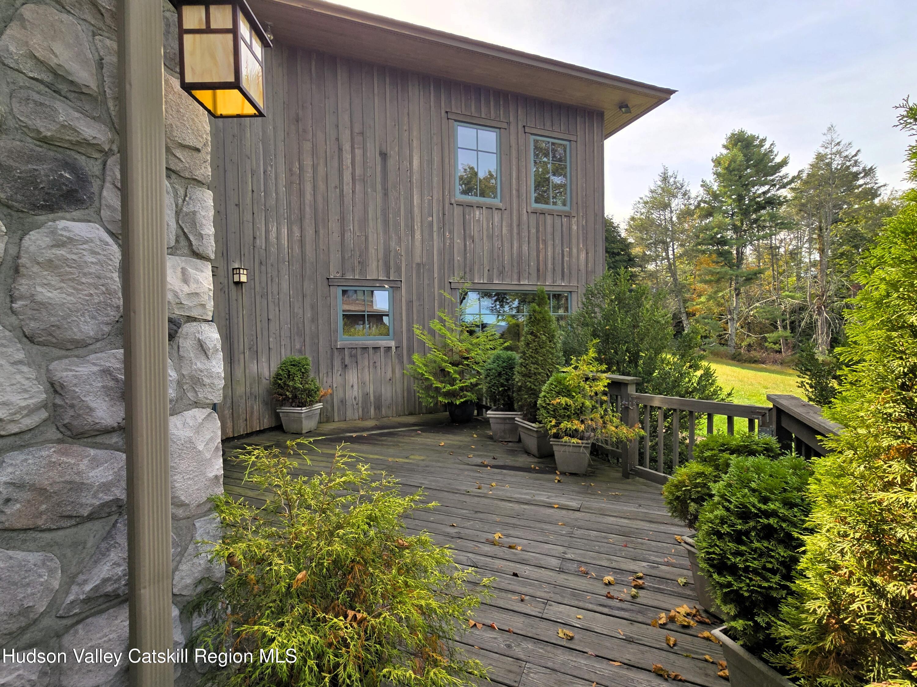 84 Highland Road Stone Ridge, NY 12484 - Photo 20 of 20 a view of a backyard with sitting area