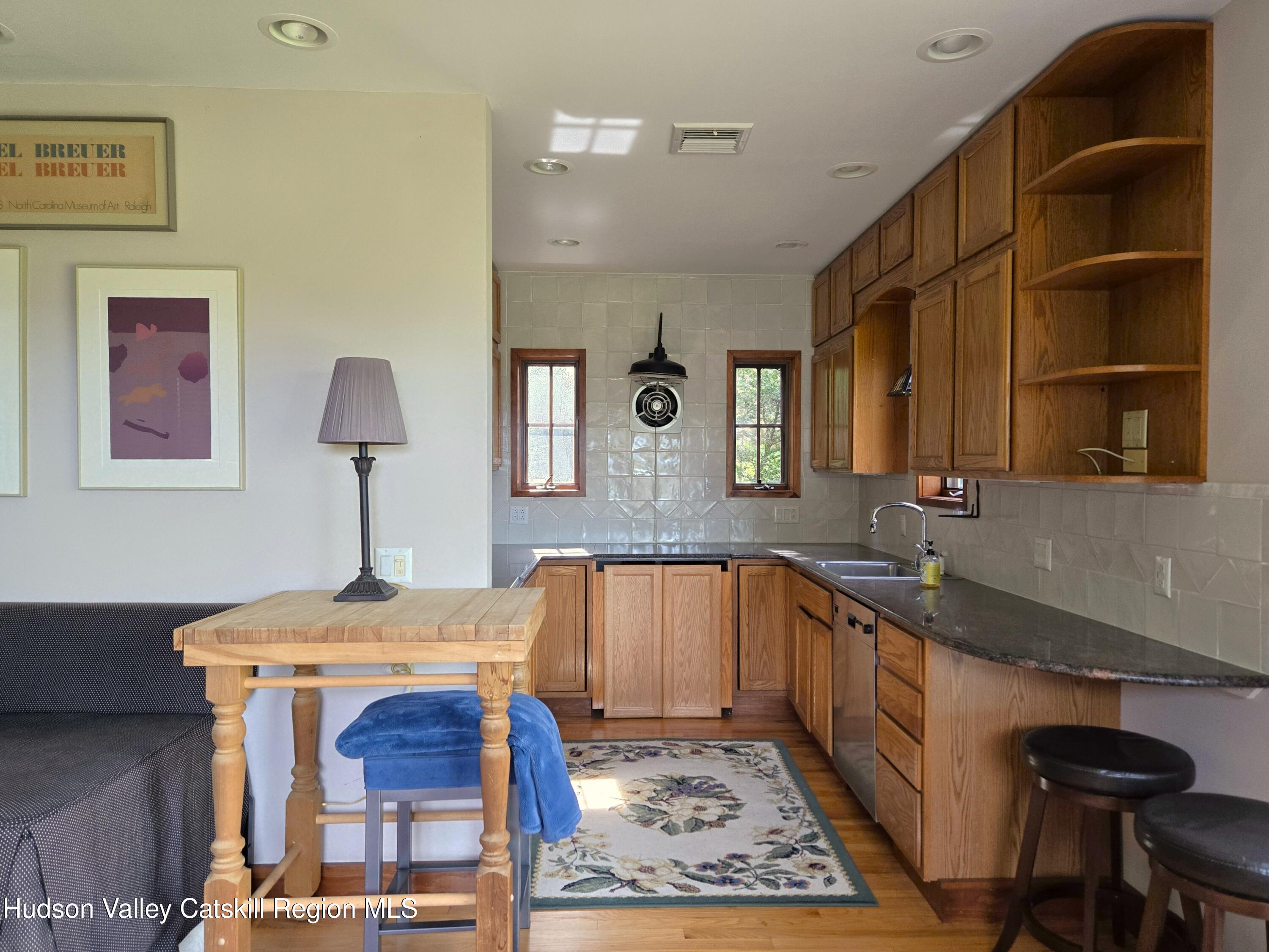 84 Highland Road Stone Ridge, NY 12484 - Photo 6 of 20 a kitchen with a sink and cabinets