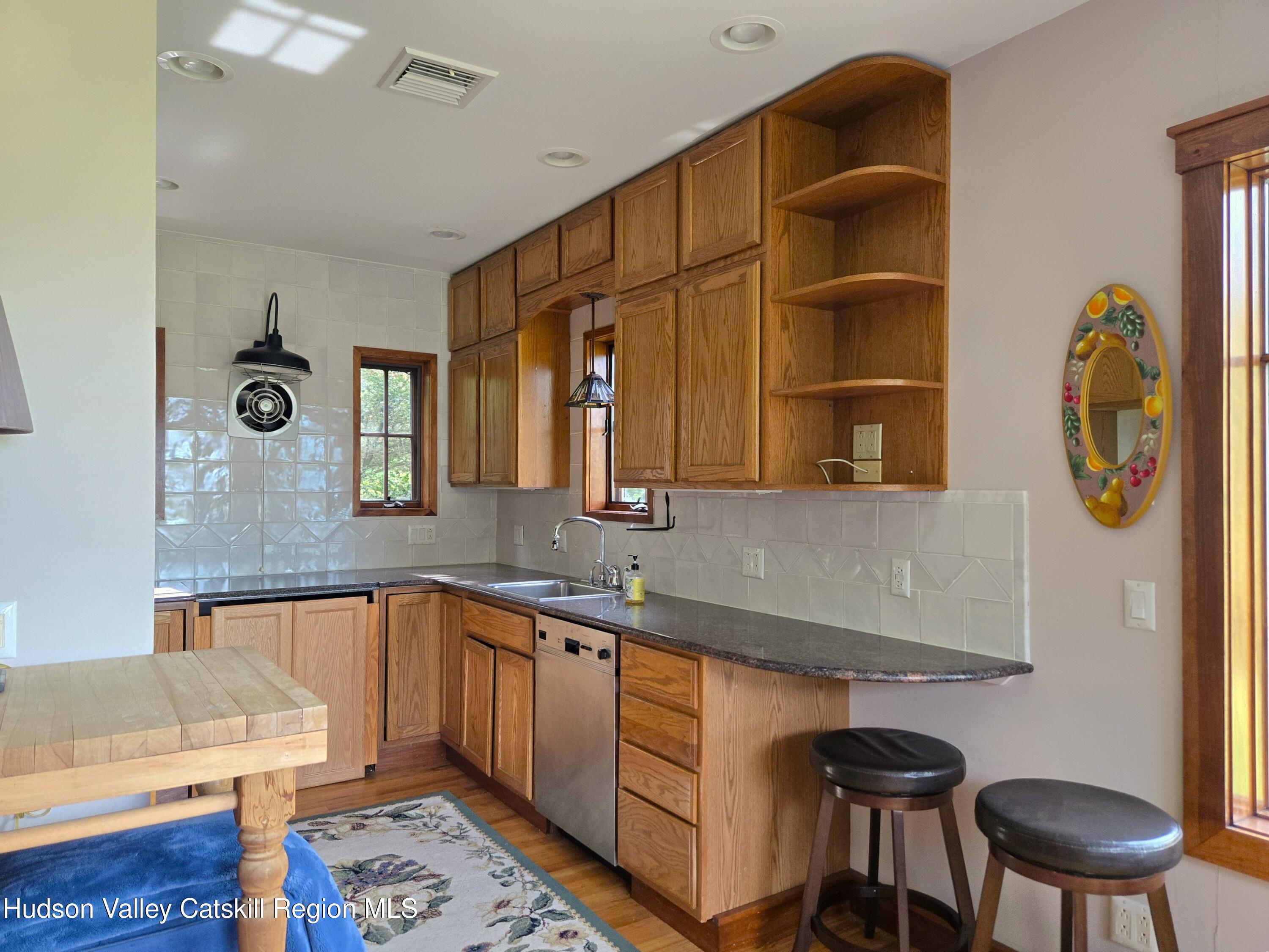 84 Highland Road Stone Ridge, NY 12484 - Photo 7 of 20 a bathroom with a sink and a mirror