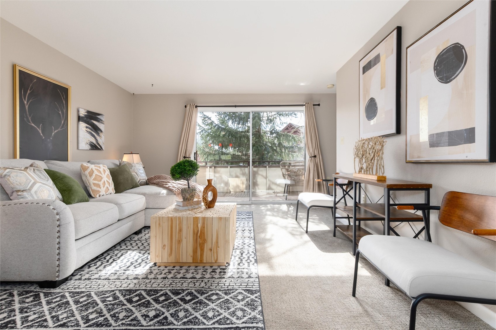 163 High Tor Road, Unit 7 Breckenridge, CO 80424 - Photo 2 of 42 a living room with furniture and a large window