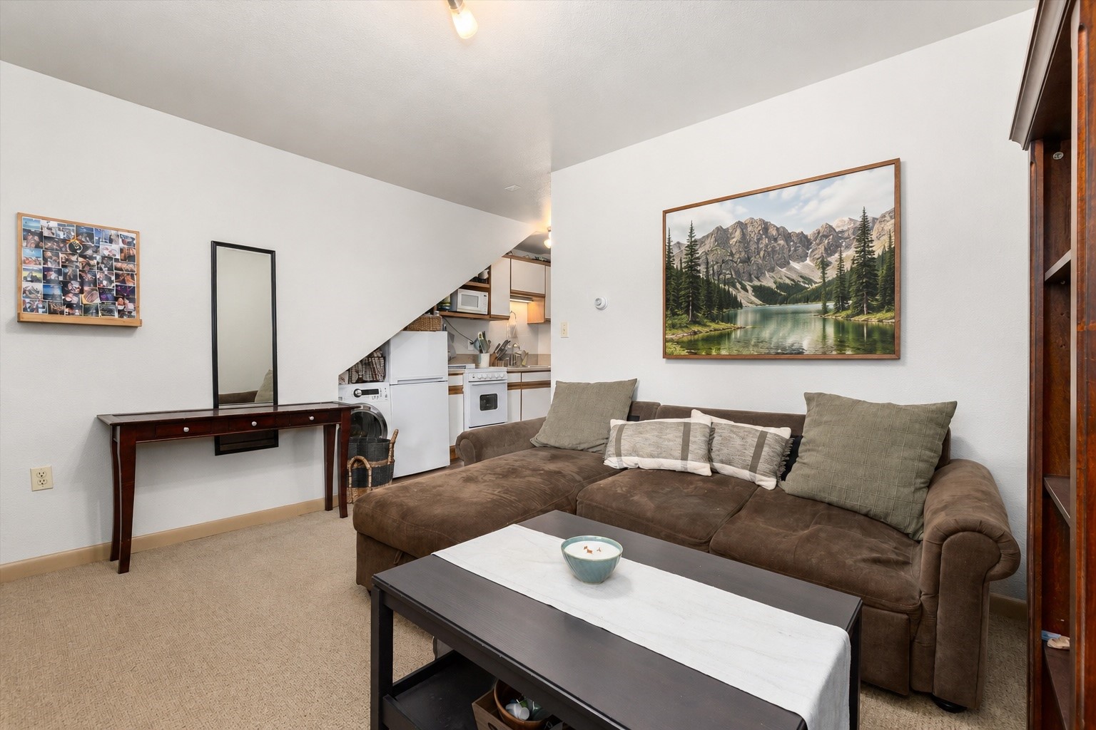 163 High Tor Road, Unit 7 Breckenridge, CO 80424 - Photo 32 of 42 a living room with furniture and a painting on the wall