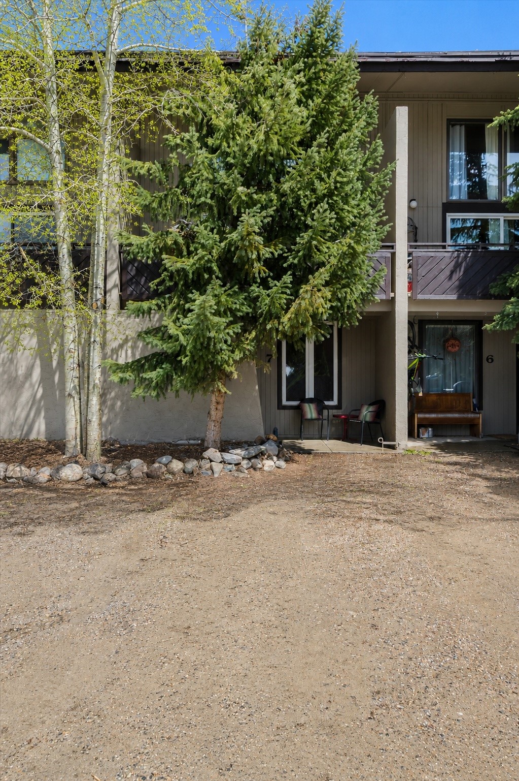 163 High Tor Road, Unit 7 Breckenridge, CO 80424 - Photo 37 of 42 a front view of a house with a yard