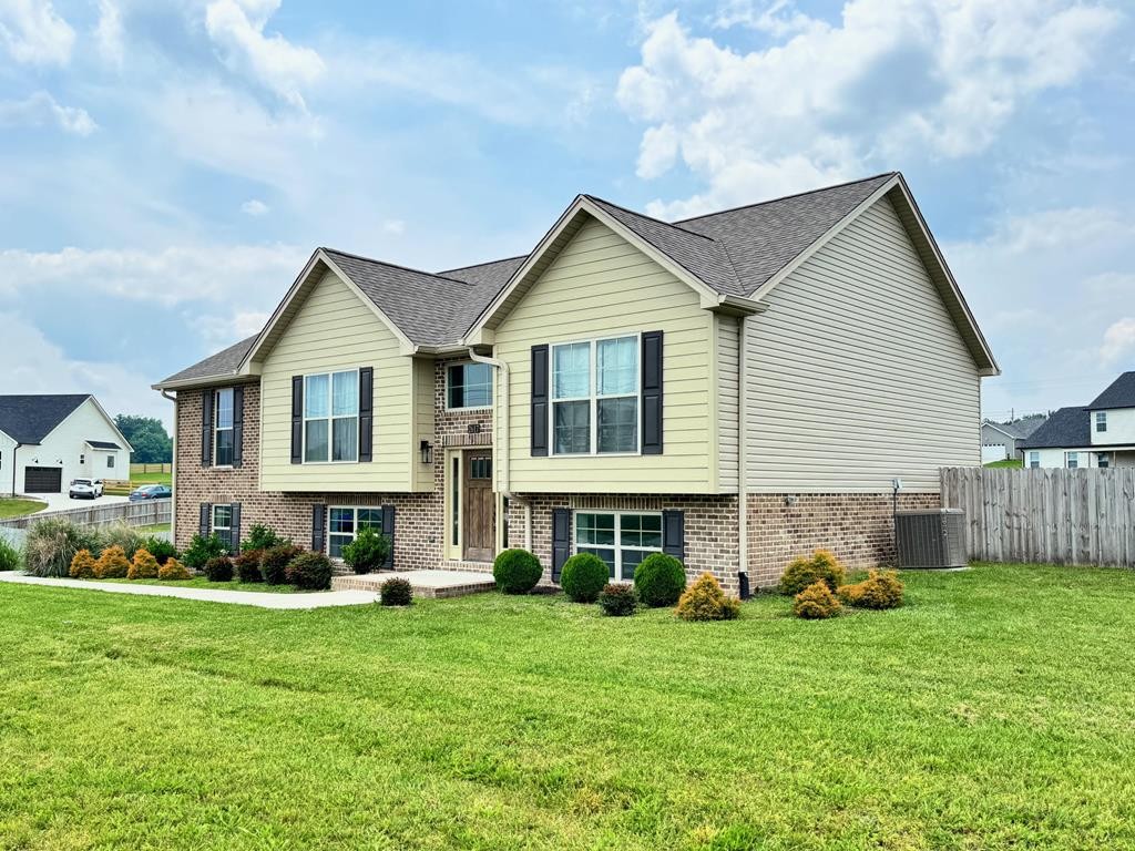 2617 Spring Arbor Court Cookeville, TN 38501 - Photo 27 of 32 a front view of a house with a yard and trees