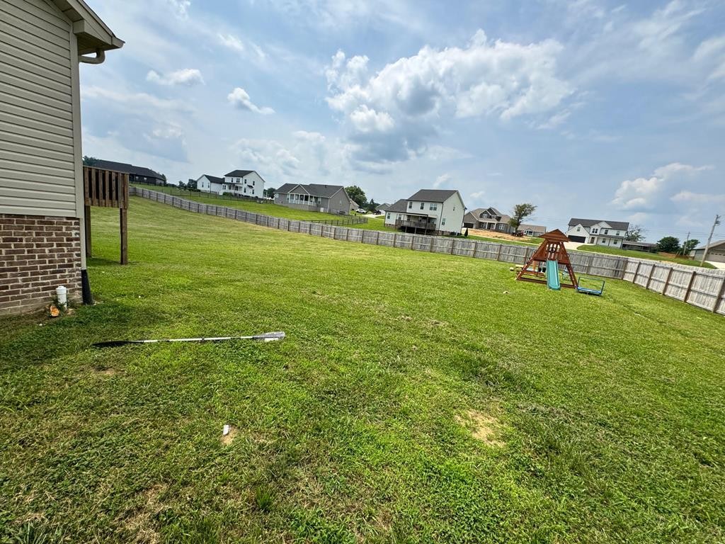 2617 Spring Arbor Court Cookeville, TN 38501 - Photo 30 of 32 a view of a lake with houses in the back