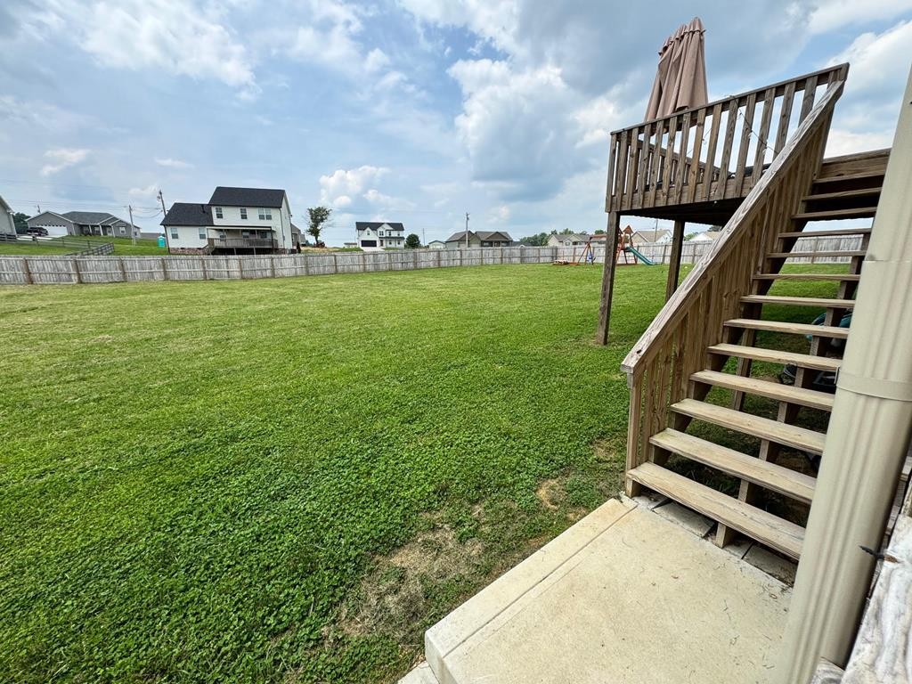 2617 Spring Arbor Court Cookeville, TN 38501 - Photo 32 of 32 a view of a swimming pool with a garden and deck
