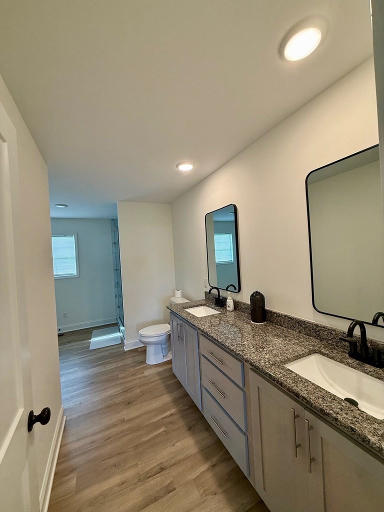 2617 Spring Arbor Court Cookeville, TN 38501 - Photo 7 of 32 a bathroom with a granite countertop sink and a mirror