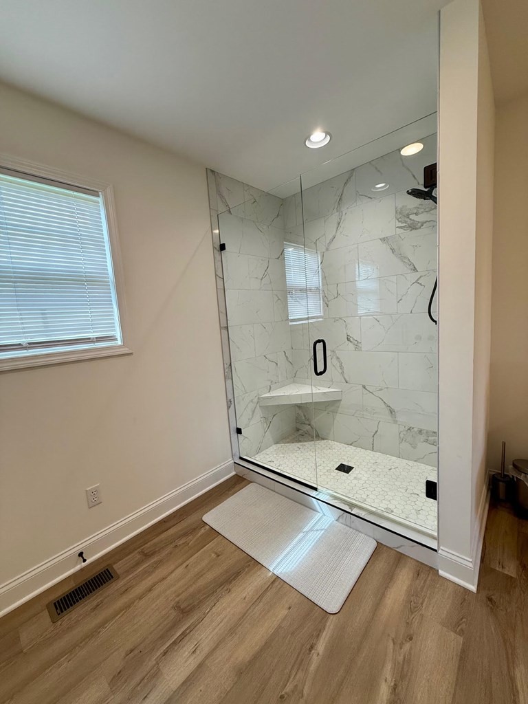 2617 Spring Arbor Court Cookeville, TN 38501 - Photo 10 of 32 a bathroom with a bathtub and a shower