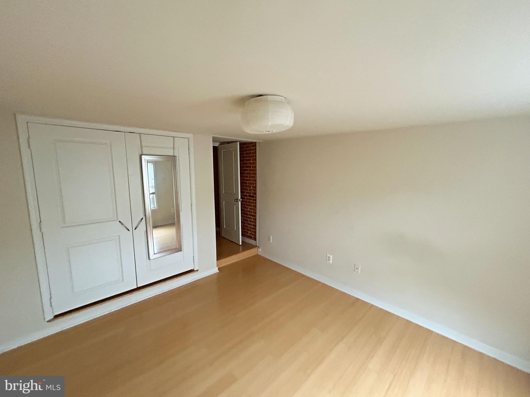 118 West Randall Street Baltimore, MD 21230 - Photo 15 of 22 a view of an empty room and window