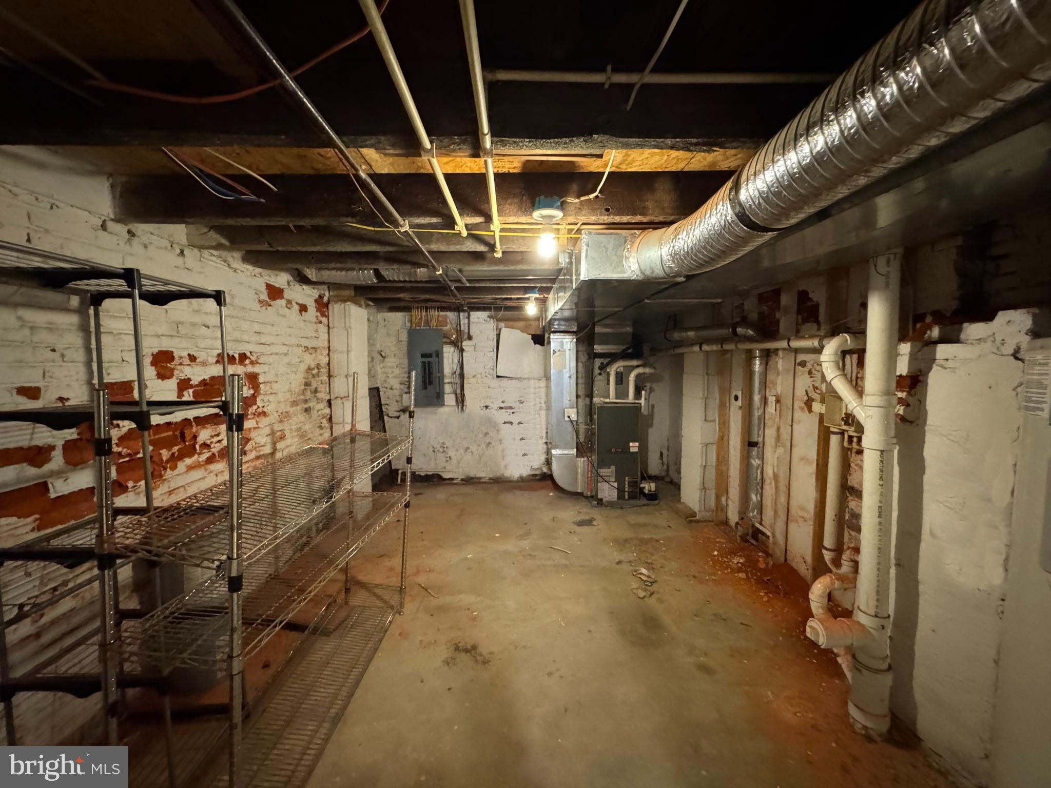 118 West Randall Street Baltimore, MD 21230 - Photo 22 of 22 a view of an empty room with wooden walls