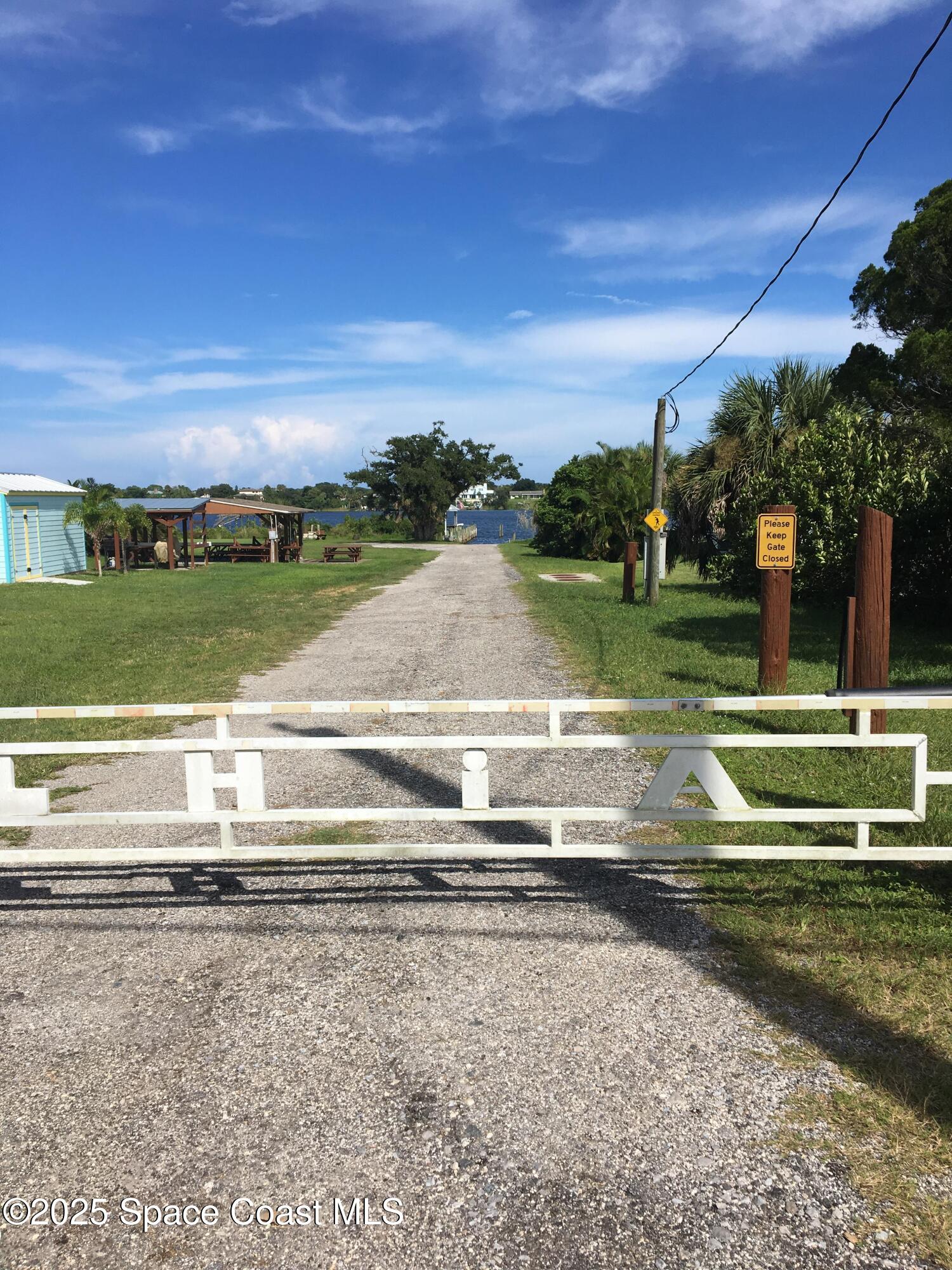 4 Oak Street Micco, FL 32976 - Photo 3 of 7 a view of lake