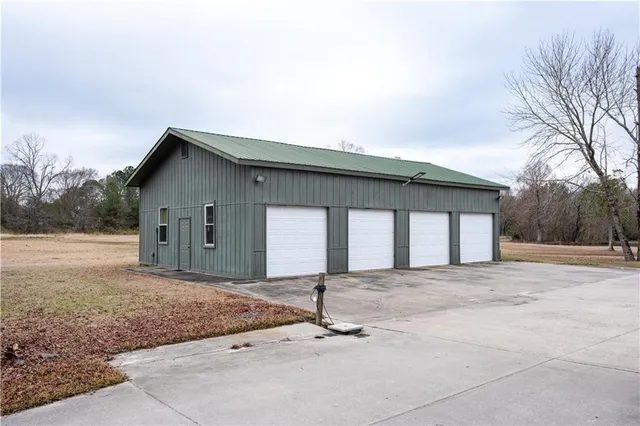 a front view of a house with backyard