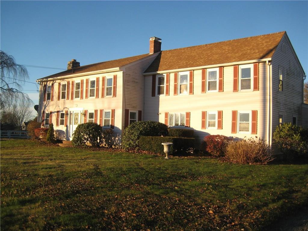 1297 North Road Killingly, CT 06241 - Photo 1 of 1 a front view of a house with a yard