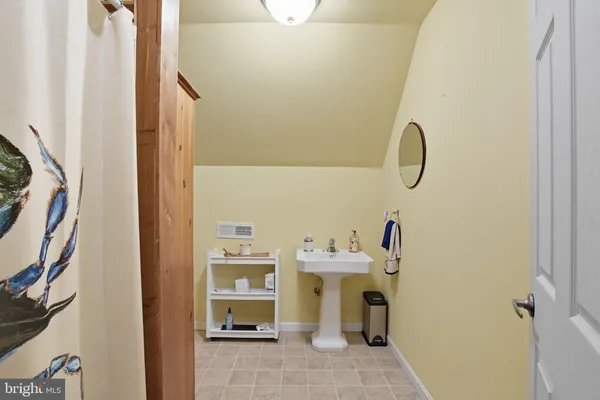 a house with swimming pool in front of it