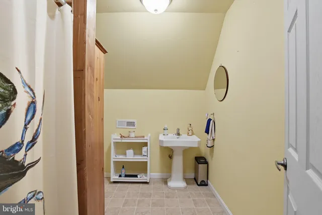 a house with swimming pool in front of it