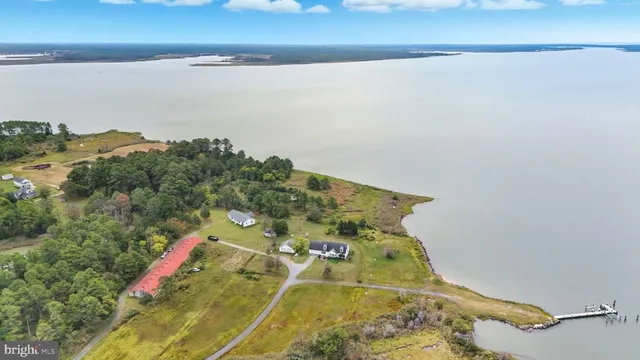 an aerial view of lake and mountain