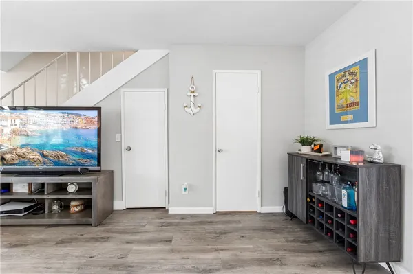 a view of a livingroom with furniture and toys