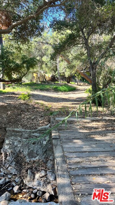 3485 Old Topanga Canyon Road Calabasas, CA 91302 - Photo 2 of 17 a view of yard with green space