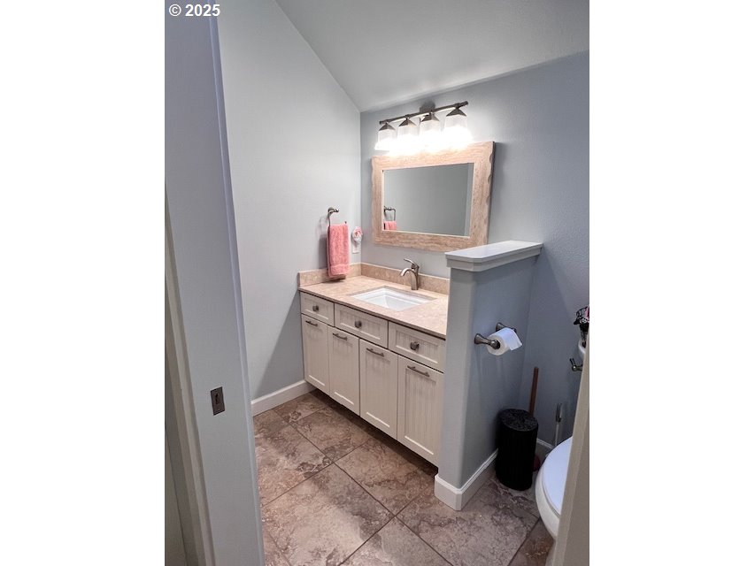 83178 South Pioneer Road Florence, OR 97439 - Photo 28 of 47 a bathroom with a sink and a mirror