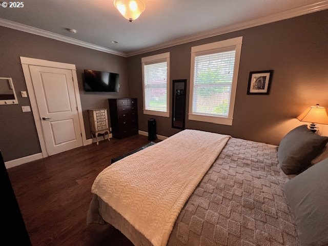 83178 South Pioneer Road Florence, OR 97439 - Photo 6 of 47 a bedroom with a bed flat screen tv and a window