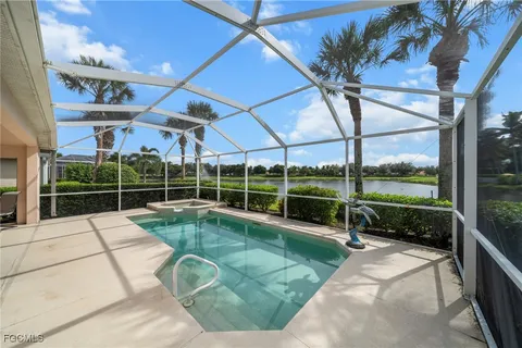 a view of a swimming pool with a porch