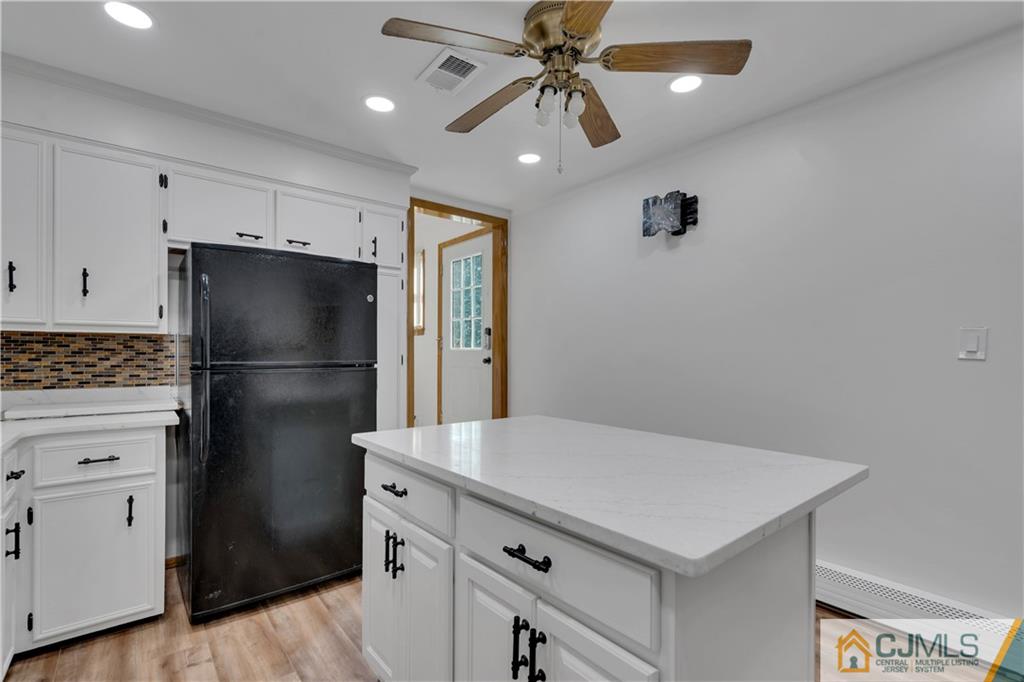 16 Channing Road East Brunswick, NJ 08816 - Photo 12 of 36 a kitchen with a refrigerator and a refrigerator