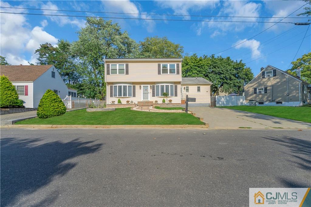 16 Channing Road East Brunswick, NJ 08816 - Photo 2 of 36 front view of house with a yard