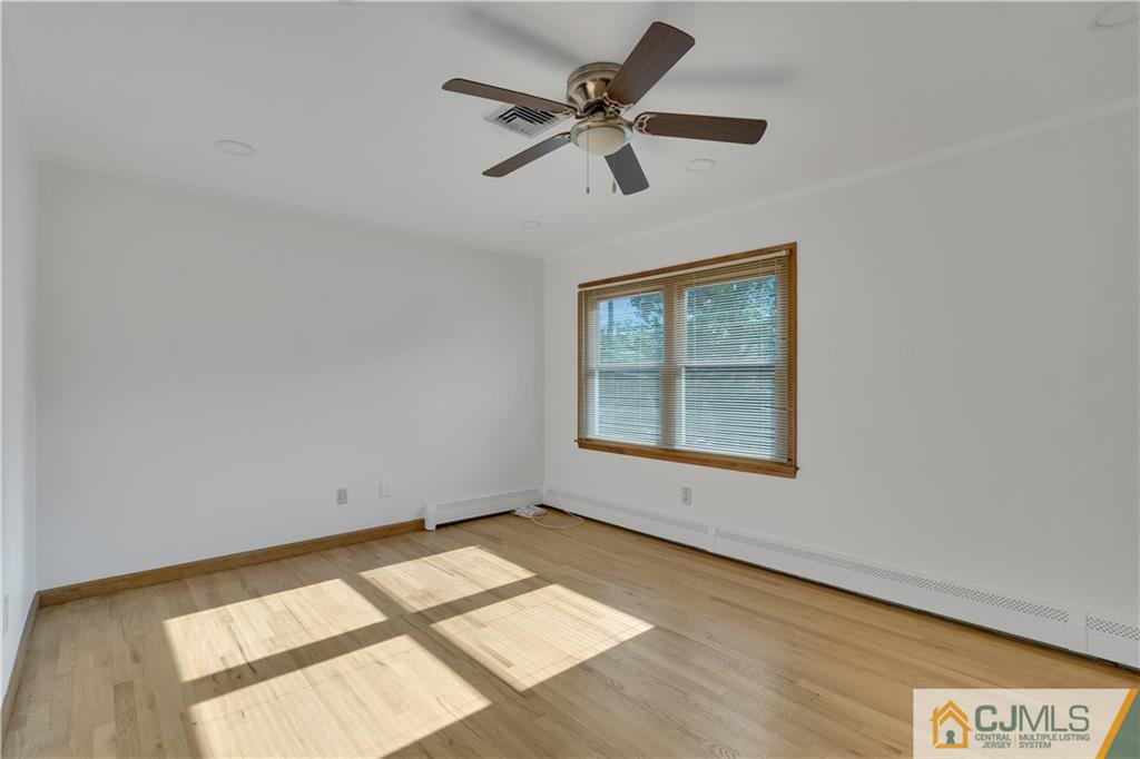 16 Channing Road East Brunswick, NJ 08816 - Photo 27 of 36 a view of an empty room with a window