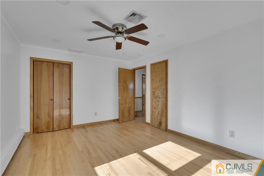 16 Channing Road East Brunswick, NJ 08816 - Photo 28 of 36 a view of a big room with wooden floor and windows
