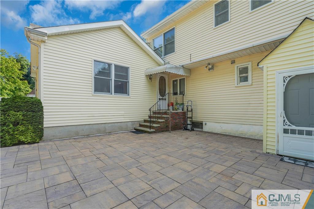 16 Channing Road East Brunswick, NJ 08816 - Photo 29 of 36 a view of a house with backyard