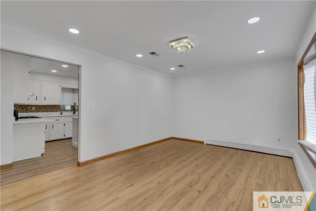 16 Channing Road East Brunswick, NJ 08816 - Photo 4 of 36 a view of kitchen with wooden floor