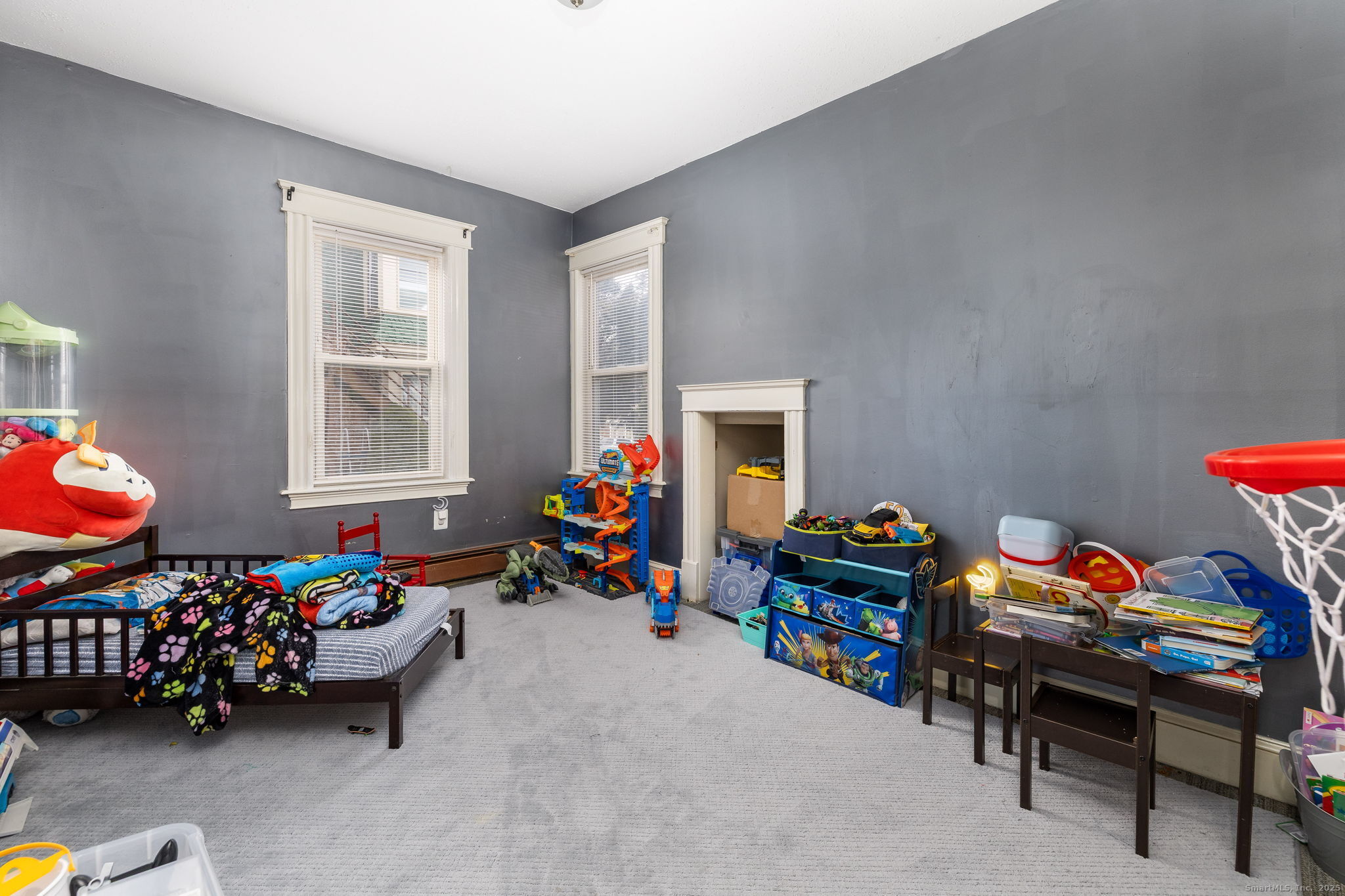 372 Pleasant Street Windham, CT 06226 - Photo 16 of 30 a bedroom with furniture a rug and a window