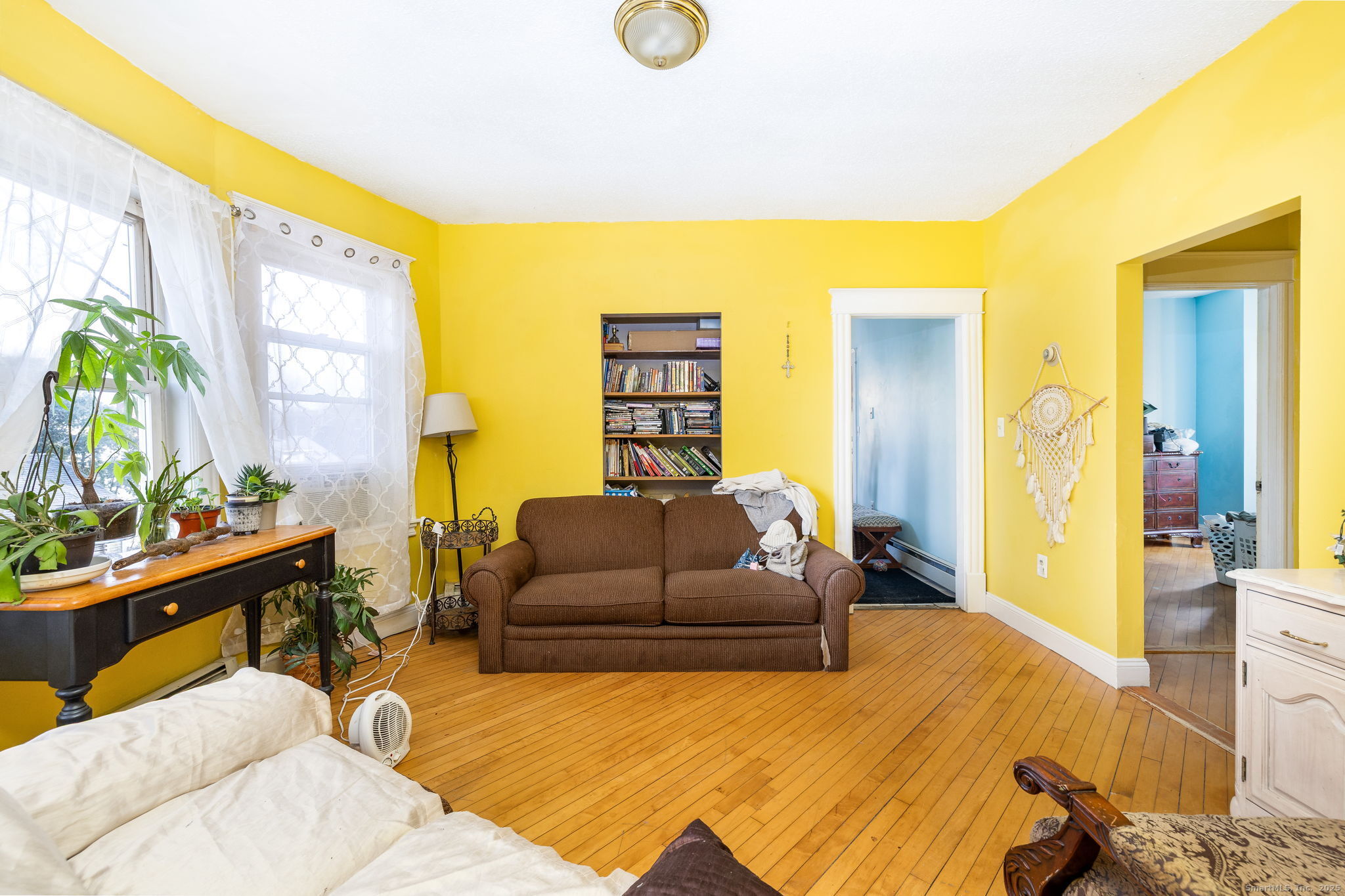 372 Pleasant Street Windham, CT 06226 - Photo 20 of 30 a living room with furniture and a wooden floor