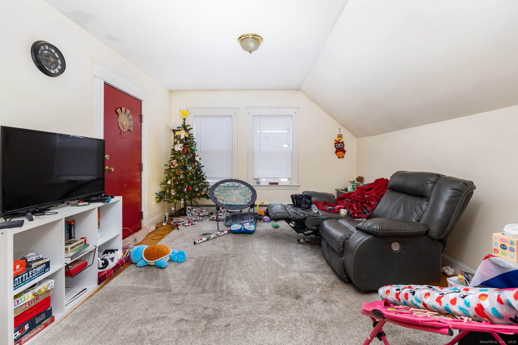 372 Pleasant Street Windham, CT 06226 - Photo 25 of 30 a living room with furniture and a flat screen tv