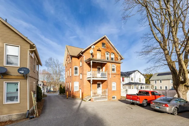 a view of a street with cars