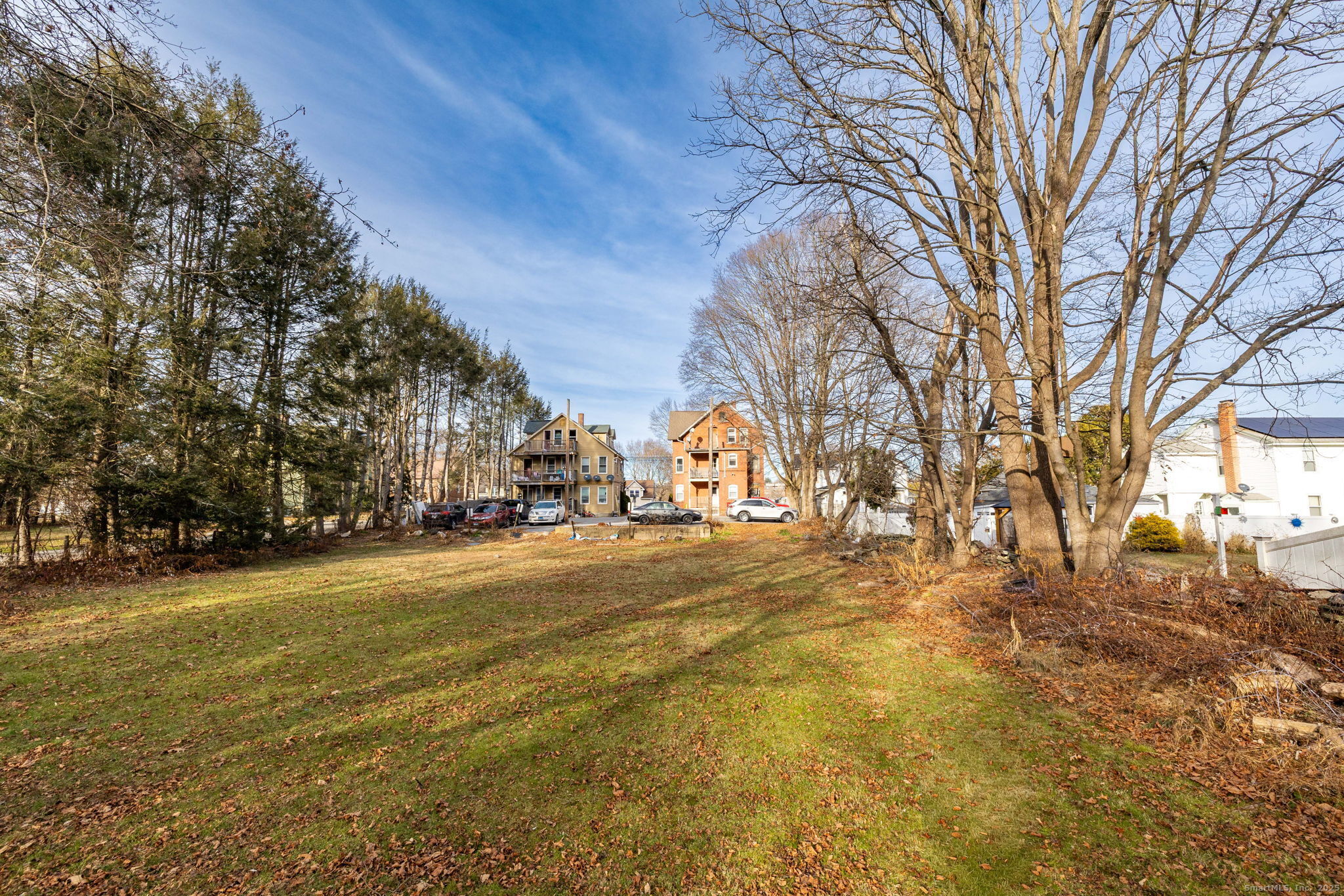 372 Pleasant Street Windham, CT 06226 - Photo 7 of 30 a view of road with large trees