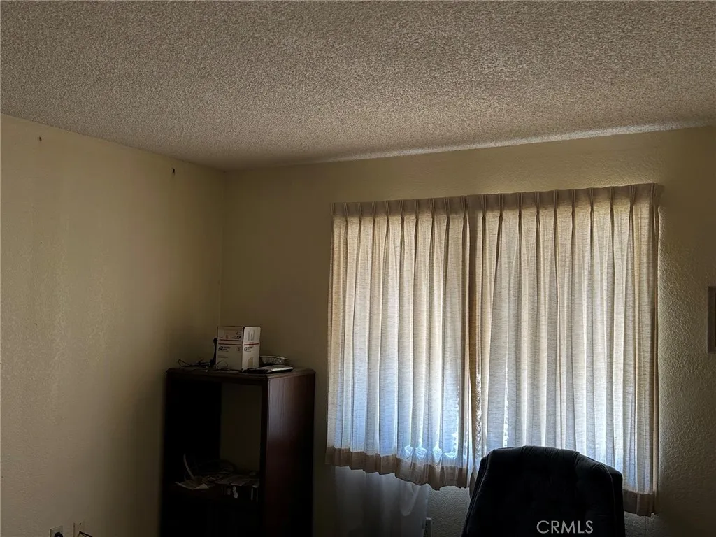27250 Murrieta Road, Unit 347 Menifee, CA 92586 - Photo 24 of 38 an empty room with a window