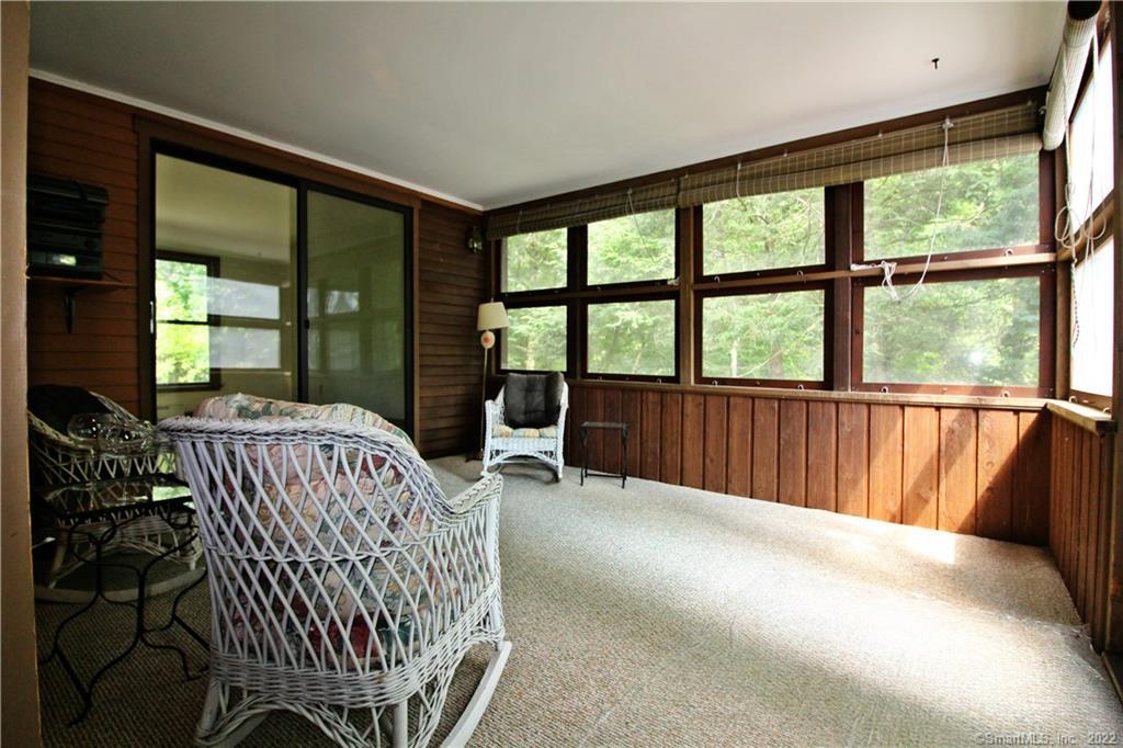 33 Ridgewood Rd Exd Woodbury, CT 06798 - Photo 1 of 1 Screened in porch for relaxing
