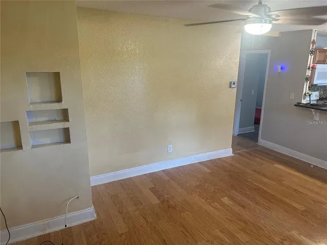 an empty room with a bathroom