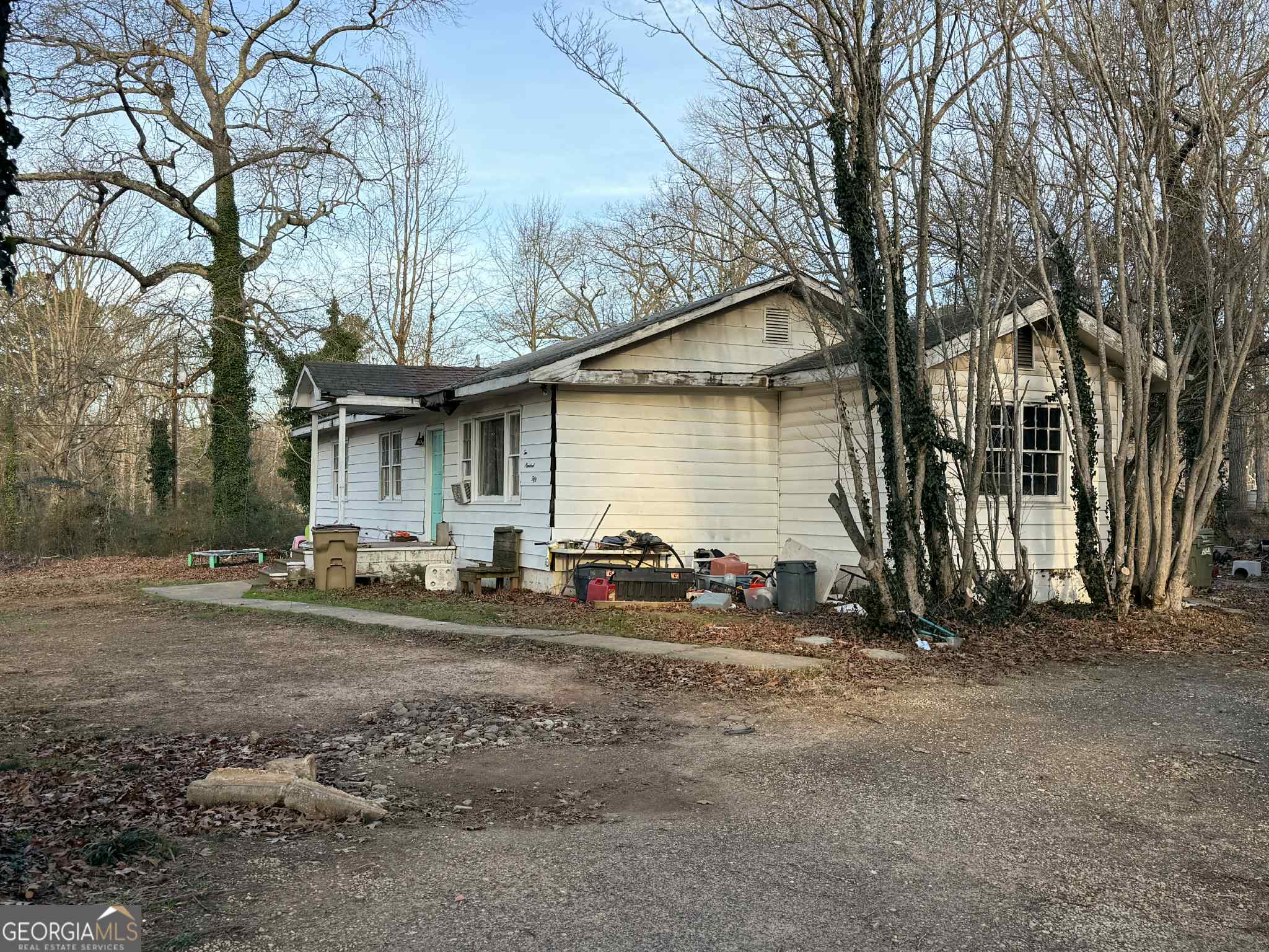 250 Robin Hood Lane Hampton, GA 30228 - Photo 2 of 4 a view of a house with backyard and sitting area