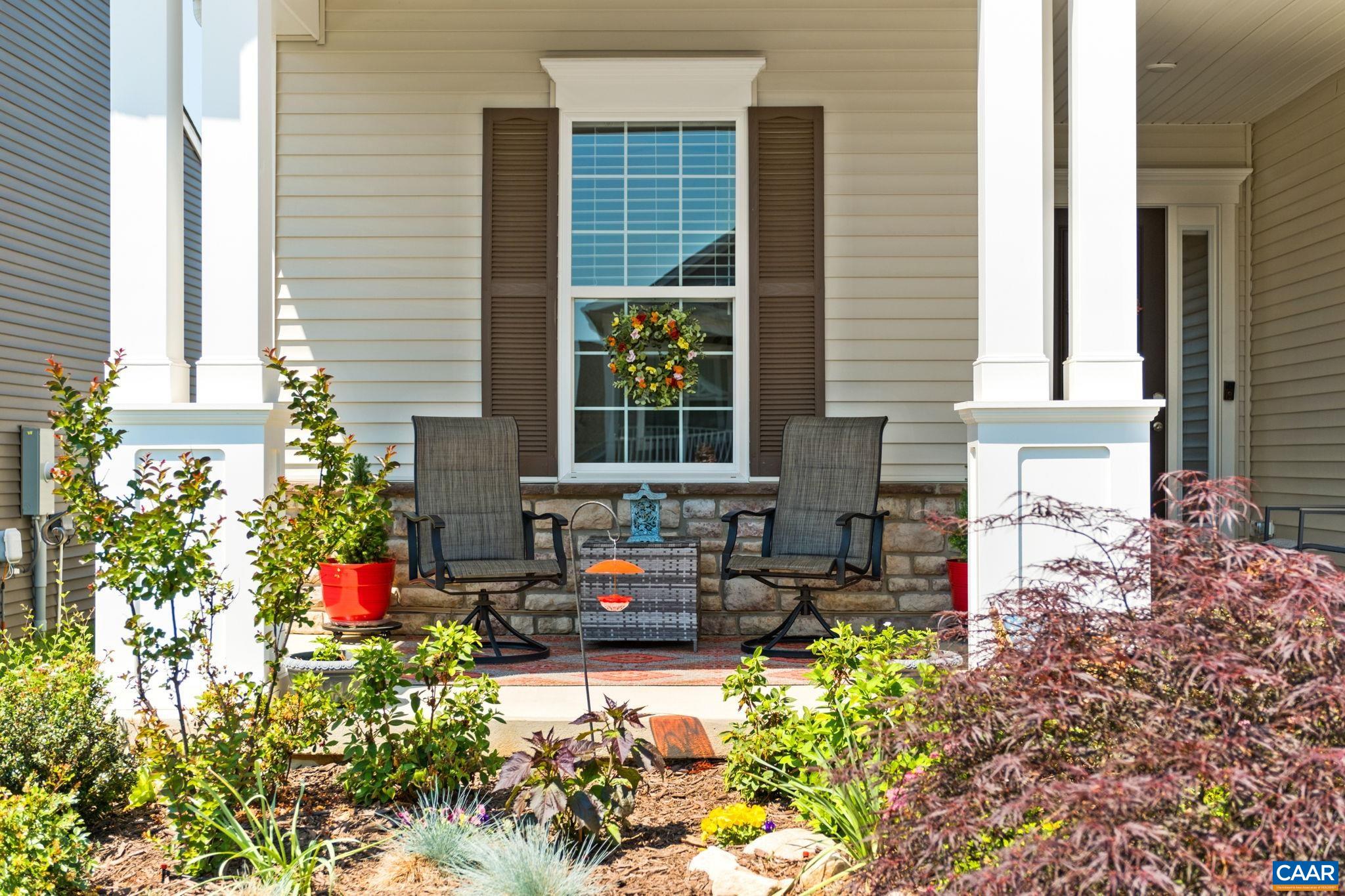 124 Stodghill Drive Ruckersville, VA 22968 - Photo 6 of 58 a living room filled with furniture and a potted plant