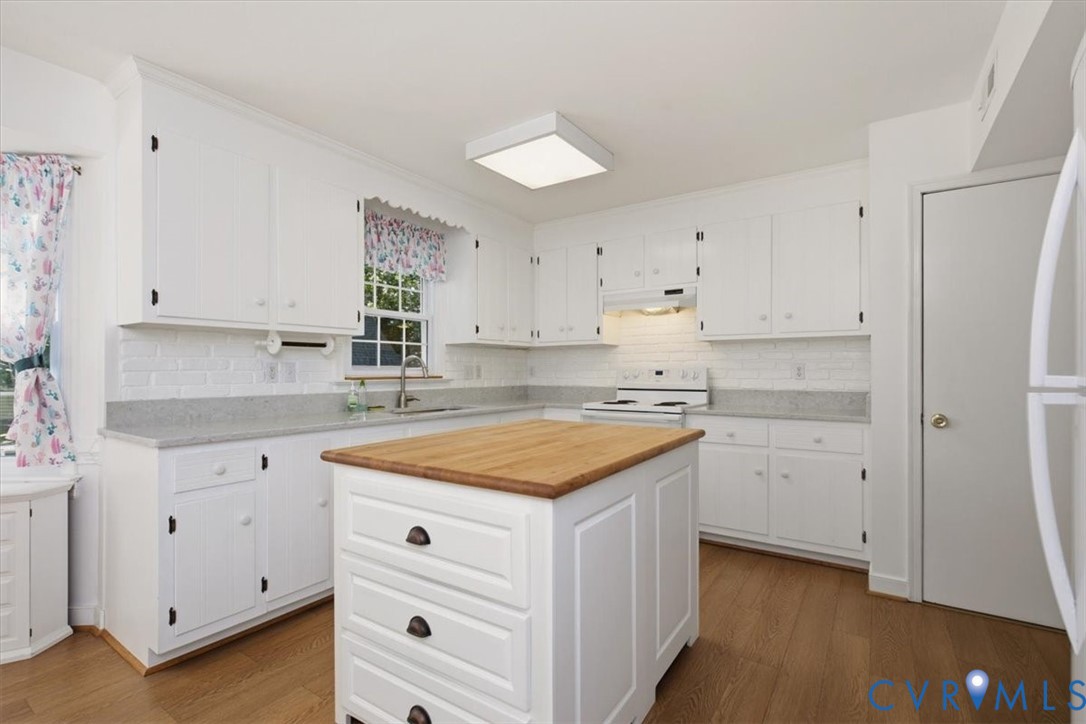 13905 Shadow Ridge Lane Midlothian, VA 23112 - Photo 21 of 55 Kitchen featuring white cabinetry, light-colored c